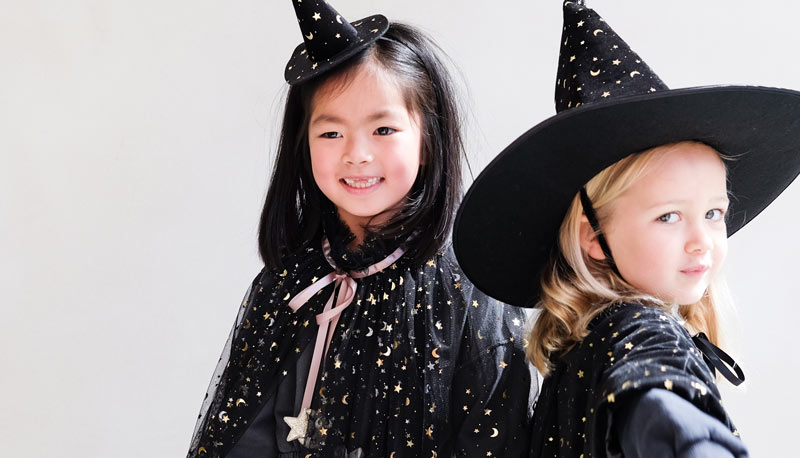 Two girls in the Mimi & Lula Luxe Velvet Witches Hat and Magical Witches Cape
